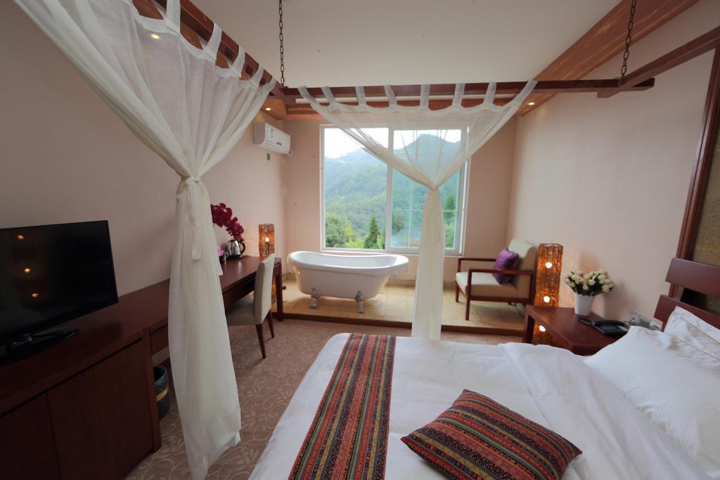 Panshan Tingquan Tuwo Holiday Resort Лэшань Номер фото