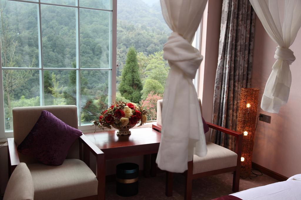 Panshan Tingquan Tuwo Holiday Resort Лэшань Номер фото