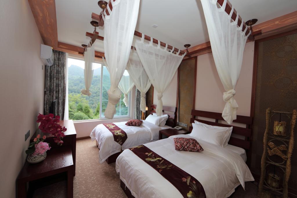 Panshan Tingquan Tuwo Holiday Resort Лэшань Номер фото