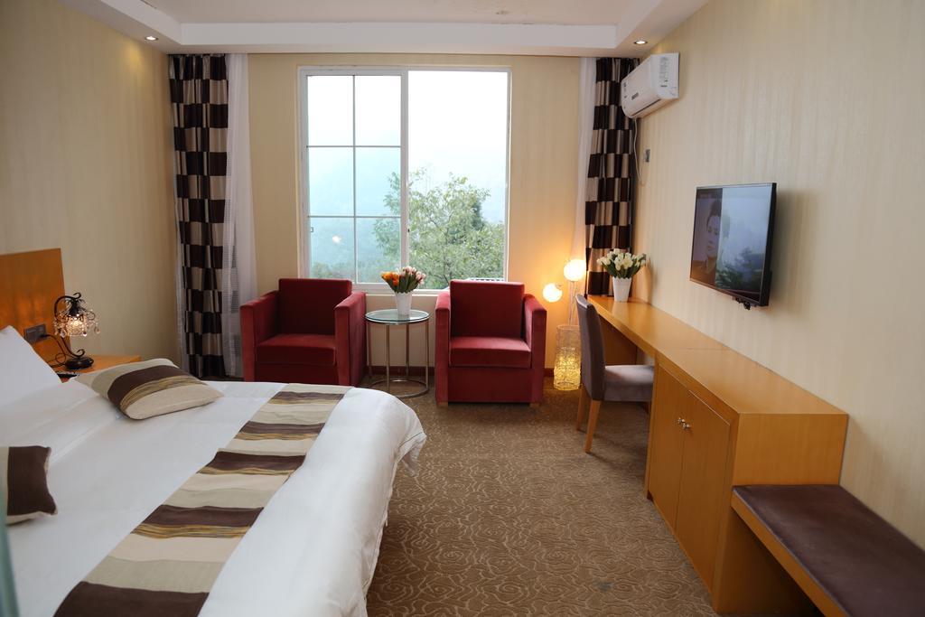 Panshan Tingquan Tuwo Holiday Resort Лэшань Номер фото