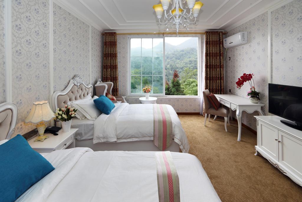 Panshan Tingquan Tuwo Holiday Resort Лэшань Номер фото