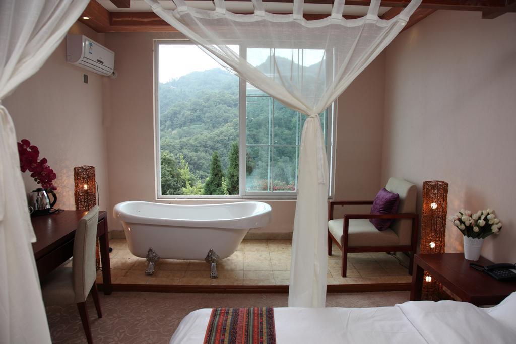 Panshan Tingquan Tuwo Holiday Resort Лэшань Номер фото